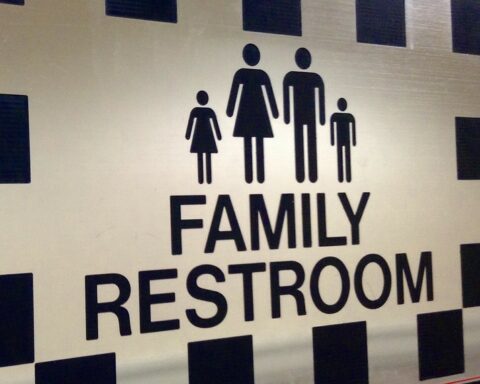 restroom sign - Texas man