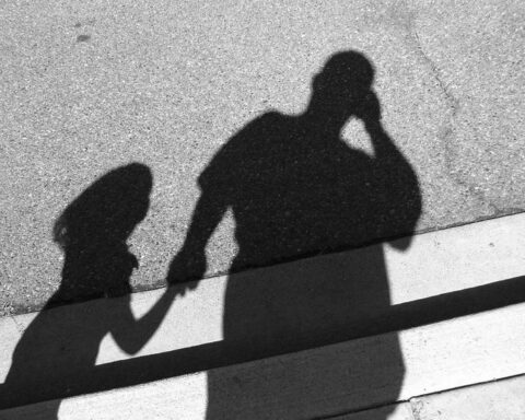 dad and daughter's shadows holding hands - bad dad