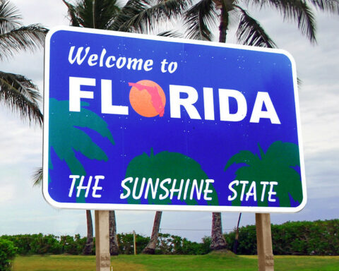 Welcome to Florida sign - Florida woman