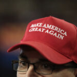 man wearing MAGA hat